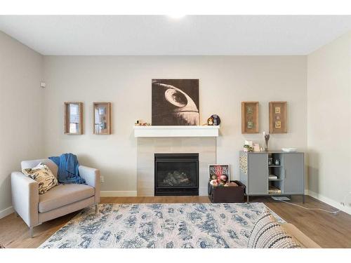 84 Walgrove Terrace Se, Calgary, AB - Indoor Photo Showing Living Room With Fireplace