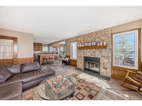 47 Edgeridge Court Nw, Calgary, AB - Indoor Photo Showing Living Room With Fireplace