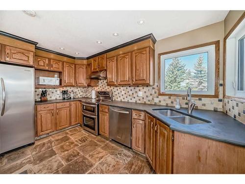 47 Edgeridge Court Nw, Calgary, AB - Indoor Photo Showing Kitchen With Double Sink