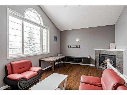 71 Wentworth Circle Sw, Calgary, AB - Indoor With Fireplace