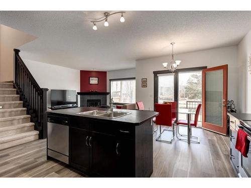 263 Silverado Plains Close Sw, Calgary, AB - Indoor Photo Showing Kitchen With Double Sink