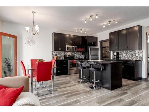 263 Silverado Plains Close Sw, Calgary, AB - Indoor Photo Showing Kitchen With Upgraded Kitchen