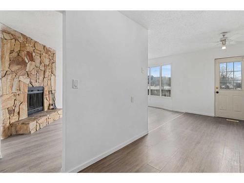 2820 46 Street Se, Calgary, AB - Indoor With Fireplace
