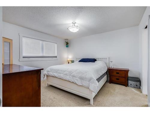 1130 Maple Avenue, Crossfield, AB - Indoor Photo Showing Bedroom
