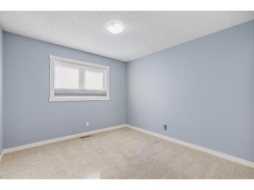 1130 Maple Avenue, Crossfield, AB - Indoor Photo Showing Other Room