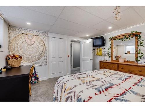 1130 Maple Avenue, Crossfield, AB - Indoor Photo Showing Bedroom