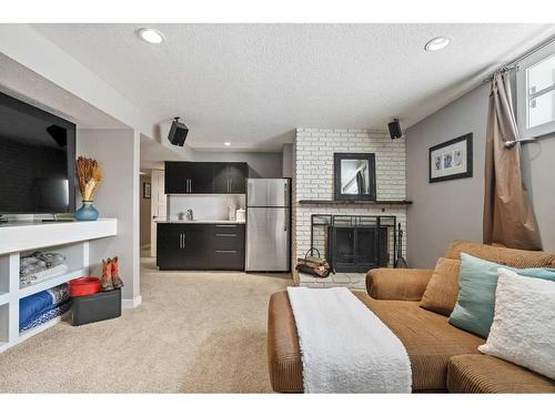 643 Woodsworth Road Se, Calgary, AB - Indoor With Fireplace