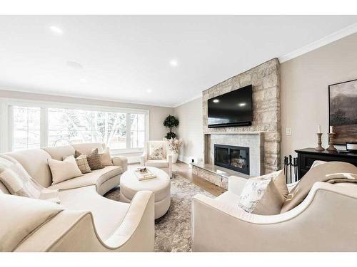 13107 Lake Arrow Road Se, Calgary, AB - Indoor Photo Showing Living Room With Fireplace