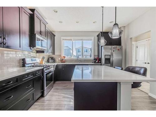 67 Legacy Glen Row Se, Calgary, AB - Indoor Photo Showing Kitchen With Upgraded Kitchen