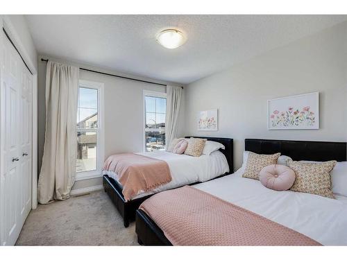 177 Buckskin Way, Cochrane, AB - Indoor Photo Showing Bedroom