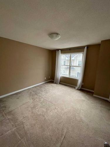 3026 New Brighton Gardens Se, Calgary, AB - Indoor Photo Showing Other Room