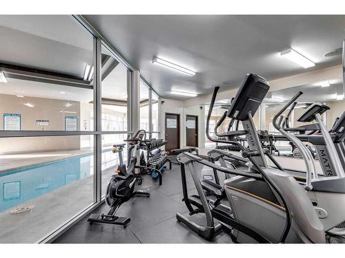 3-104 Village Heights Sw, Calgary, AB - Indoor Photo Showing Gym Room