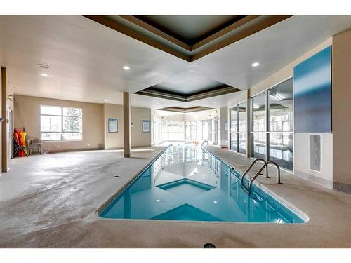 3-104 Village Heights Sw, Calgary, AB - Indoor Photo Showing Other Room With In Ground Pool