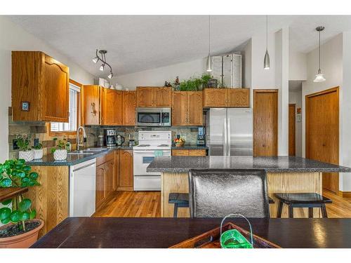 130 Settler Way, Canmore, AB - Indoor Photo Showing Kitchen With Double Sink