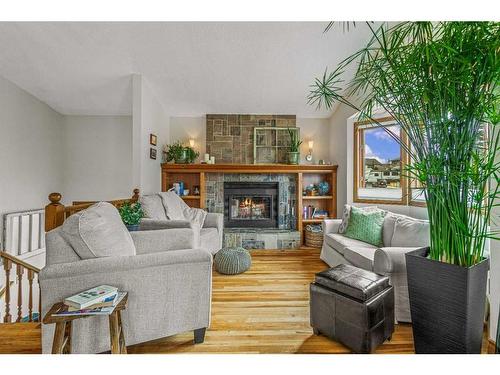 130 Settler Way, Canmore, AB - Indoor Photo Showing Living Room With Fireplace