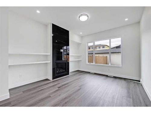 4627 72 Street Nw, Calgary, AB - Indoor With Fireplace