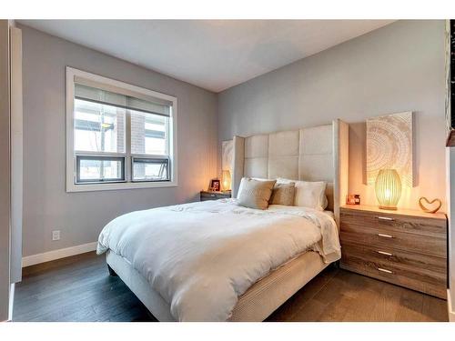 205-1410 1 Street Se, Calgary, AB - Indoor Photo Showing Bedroom
