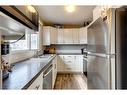 302-5340 17 Avenue Sw, Calgary, AB  - Indoor Photo Showing Kitchen With Double Sink 