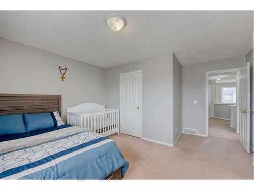19 Taravista Crescent Ne, Calgary, AB - Indoor Photo Showing Bedroom