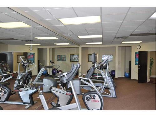 310-1718 14 Avenue Nw, Calgary, AB - Indoor Photo Showing Gym Room