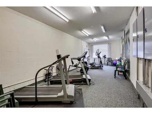 218-9449 19 Street Sw, Calgary, AB - Indoor Photo Showing Gym Room