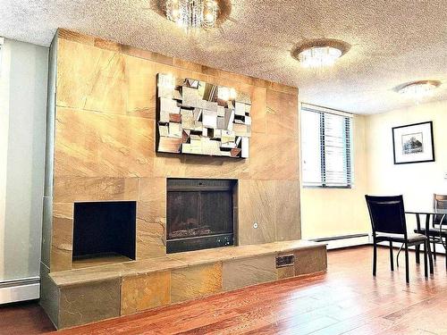 502-215 14 Avenue Sw, Calgary, AB - Indoor With Fireplace