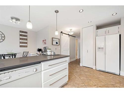 44 Millbank Close Sw, Calgary, AB - Indoor Photo Showing Kitchen