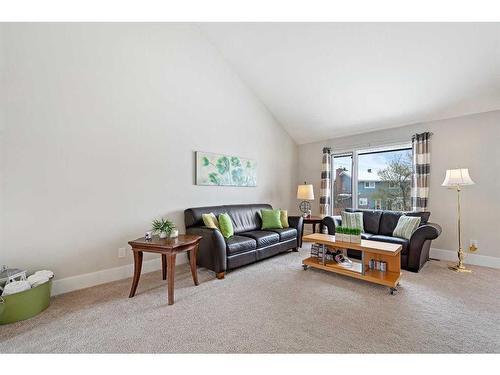 44 Millbank Close Sw, Calgary, AB - Indoor Photo Showing Living Room