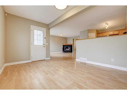 26 Royal Elm Drive Nw, Calgary, AB - Indoor With Fireplace