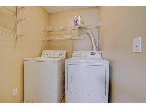 26 Royal Elm Drive Nw, Calgary, AB - Indoor Photo Showing Laundry Room