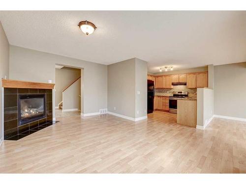 26 Royal Elm Drive Nw, Calgary, AB - Indoor With Fireplace