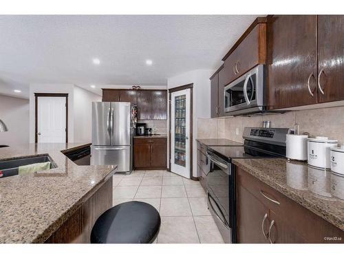 114 Saddleland Crescent Ne, Calgary, AB - Indoor Photo Showing Kitchen With Double Sink With Upgraded Kitchen