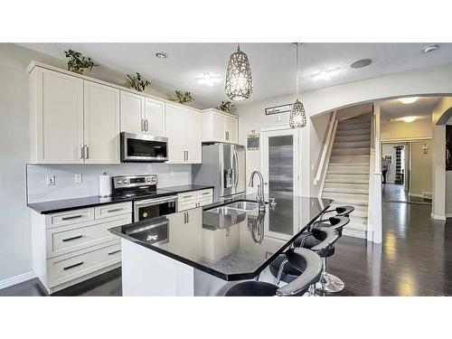 48 Auburn Springs Boulevard Se, Calgary, AB - Indoor Photo Showing Kitchen With Double Sink With Upgraded Kitchen