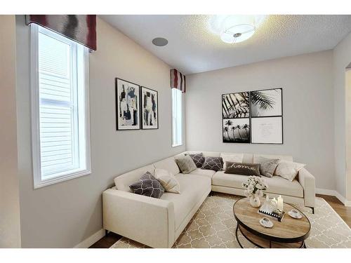 48 Auburn Springs Boulevard Se, Calgary, AB - Indoor Photo Showing Living Room