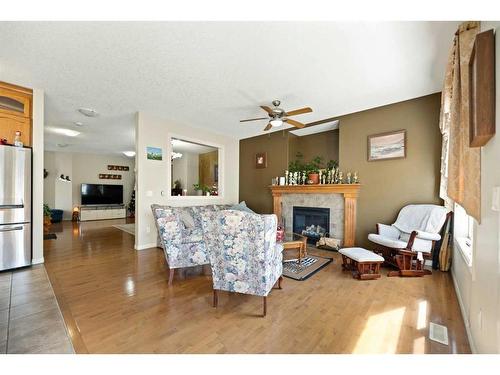 41 Taralake Heath Ne, Calgary, AB - Indoor Photo Showing Living Room With Fireplace