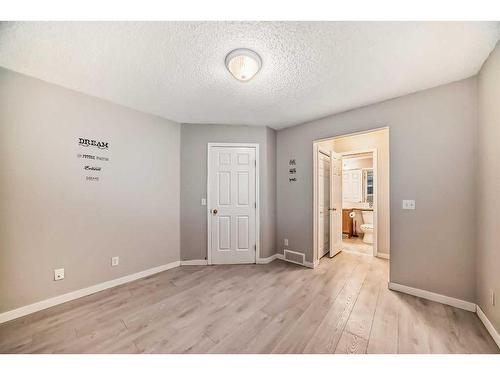 97 Martinvalley Crescent Ne, Calgary, AB - Indoor Photo Showing Other Room