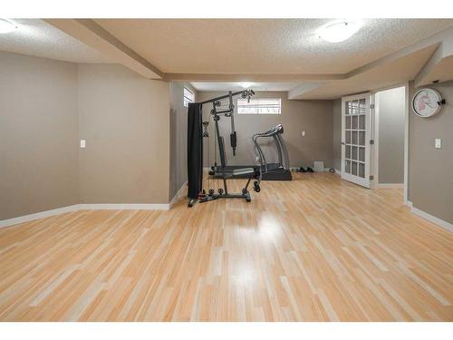 315 Hawkstone Close Nw, Calgary, AB - Indoor Photo Showing Gym Room