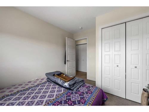 104-70 Saddlestone Drive Ne, Calgary, AB - Indoor Photo Showing Bedroom