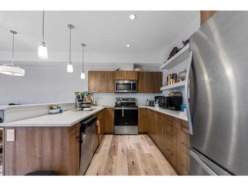 104-70 Saddlestone Drive Ne, Calgary, AB - Indoor Photo Showing Kitchen With Stainless Steel Kitchen