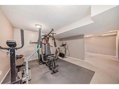 123 West Springs Way Sw, Calgary, AB - Indoor Photo Showing Gym Room