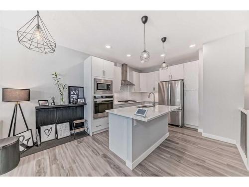 47 Crestbrook Drive Sw, Calgary, AB - Indoor Photo Showing Kitchen With Stainless Steel Kitchen With Upgraded Kitchen