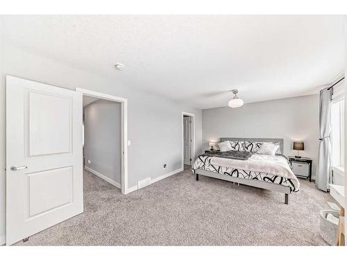 47 Crestbrook Drive Sw, Calgary, AB - Indoor Photo Showing Bedroom