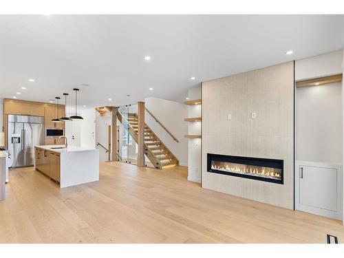 726 25 Avenue Nw, Calgary, AB - Indoor With Fireplace