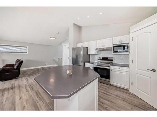 1310 Somerside Drive Sw, Calgary, AB - Indoor Photo Showing Kitchen With Stainless Steel Kitchen