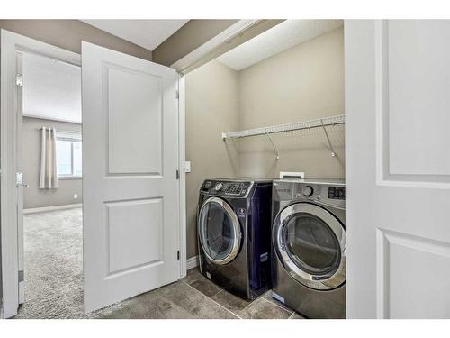 67 Nolancrest Rise Nw, Calgary, AB - Indoor Photo Showing Laundry Room