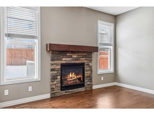 67 Nolancrest Rise Nw, Calgary, AB - Indoor Photo Showing Living Room With Fireplace