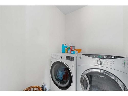 859 Tuscany Drive Nw, Calgary, AB - Indoor Photo Showing Laundry Room