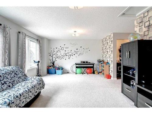 101 Mount Rae Heights, Okotoks, AB - Indoor Photo Showing Bedroom