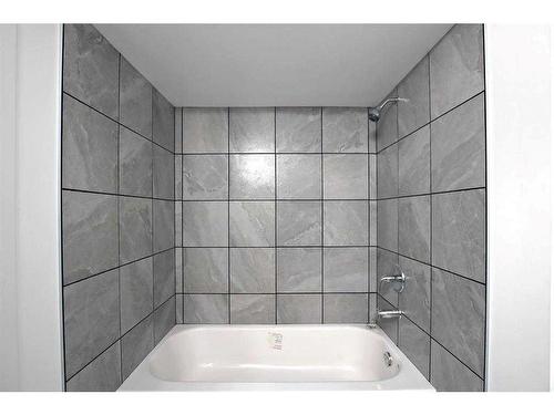 101 Mount Rae Heights, Okotoks, AB - Indoor Photo Showing Bathroom