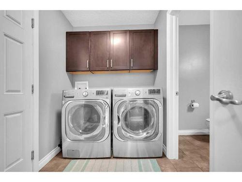 100 Rainbow Falls Row, Chestermere, AB - Indoor Photo Showing Laundry Room
